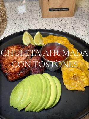 A post by @angiemarie12 on TikTok caption: Chuleta ahumada con tostones😋 #foodietiktok #foodies #kitchen #dominicanfood 