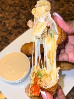 A post by @cookingwithdestiny_ on TikTok caption: Chicken Philly eggrolls w/ @Dan-O’s Seasoning 🔥 #partyplates #danospartner