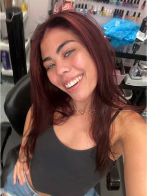 A post by @julia.marttin on TikTok caption: Brand new persssonnnn  #newhair #burgandyhair #cherrycola 