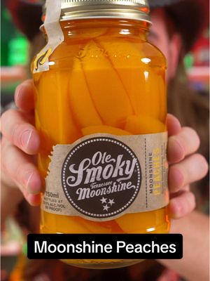 A post by @dokaryan on TikTok caption: Moonshine Peaches 🍑 #moonshine #peach #dokaryan #fyp 