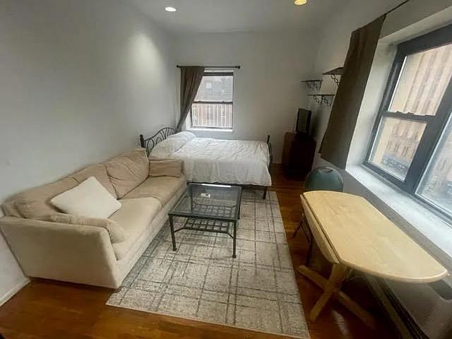 A post by @crownrealestatecompany on TikTok caption: Studio Apartment 375 sqft  Rent: $880 Per Month Including Utilities  Located at 348 East 49th Street, APT 6A, New York, New York  Description: Charming top-floor corner studio apartment available now in an elevator building with laundry facilities. This fully furnished studio includes utilities and Wi-Fi in the rent. Basic linens, towels, a microwave, dishes, and utensils are provided, allowing you to begin your New York life right away. The apartment is conveniently located within walking distance of Grand Central Station, with bank ATMs and a Morton Williams supermarket just three minutes away. Trader Joe’s is a ten-minute walk at 59th and 1st. - Rent includes Wi-Fi and all utilities. - Located on the sixth floor in a corner unit. - Features a touch panel and security camera at the entrance. - Fully furnished for your convenience. To schedule an appointment for viewing, text me at (315)395-5812  #apartmenthunting #curbappeal #dreamhome #forrent #forsale #Home #homesforsale #househunting #justlisted #justlisted + city. #justsold #midcenturymodern #newhome #newlisting #petfriendly #propert #realestateforsa #renovated #turnofthecentury #victor