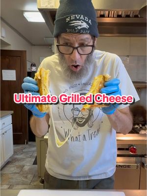 A post by @oldscoolkevmo on TikTok caption: The Ultimate Grilled Cheese Sandwich #oldscoolkevmo #sororitychef #piphichef #nevadawolfpack #pibetaphi #grilledcheese #cheesepull #thebest