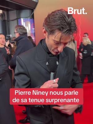 A post by @brutofficiel on TikTok caption: Pierre Niney nous parle de sa tenue surprenante #cesars2025 #pierreniney #cinema #montecristo #onregardequoi 