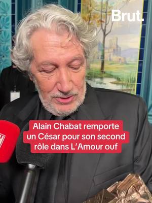 A post by @brutofficiel on TikTok caption: Alain Chabat remporte le César du meilleur second rôle dans L’Amour ouf #cesars2025 #onregardequoi #cesar #alainchabat 