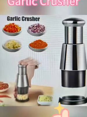 A post by @user7629610158657 on TikTok caption: Garlic crusher onion chopper #Convenient and labor-saving #kitchen gadgets #TikTokShop 