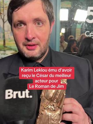 A post by @brutofficiel on TikTok caption: Karim Leklou ému d’avoir reçu le César du meilleur acteur pour Le Roman de Jim #cesars2025 #onregardequoi #cesar #cinema #karimleklou 