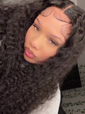 A post by @cajunfootrub on TikTok caption: Buy this wig queen😛😍😍@oqhairshop @OQHAIR #beginnerwiginstall#blackgurlmagic#wigreview #tiktokshopwigs #TikTokShopLoveAtFirstFind #gluelesswig #waterwavewig #curlyhair #longcurls