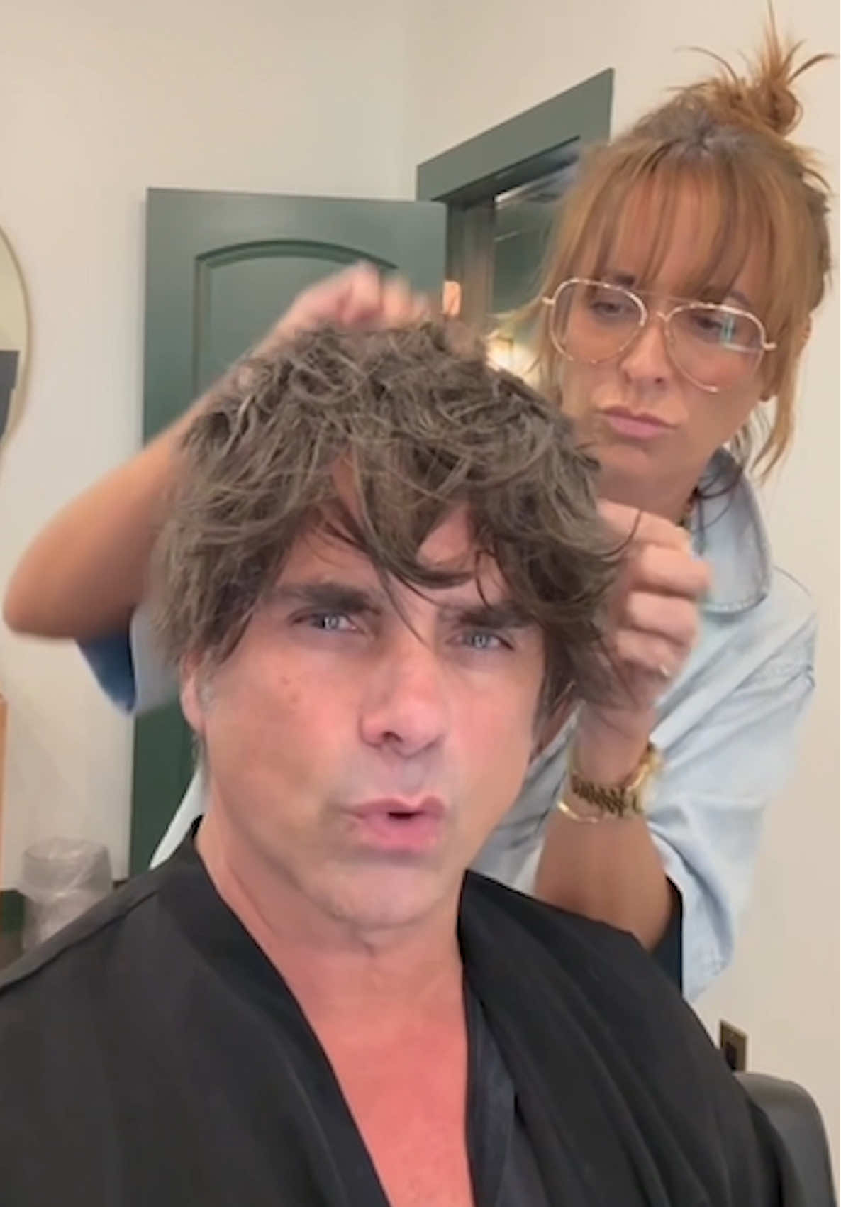 A post by @johnstamos on TikTok caption: My hair flowed so Gen Z’s could fluff…
