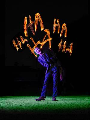 A post by @alex.stemp on TikTok caption: Fire long exposure photoshoot with The Joker 🃏🔥 @Agentᔕ Of ᛕhaoᔕ 🃏 