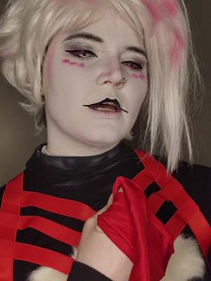 A post by @foxboi_cos on TikTok caption: 🦋🕷BOUND FOREVER 🕷🦋#AngelDust #AngelDustCosplay #Angel #HazbinHotel #HazbinHotelCosplayer #AdultCosplayer #FTMTrans #Genderfluid 