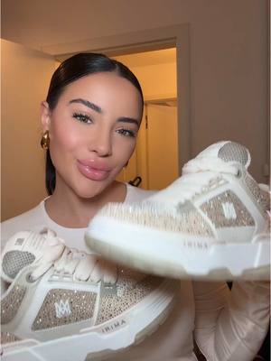 A post by @leylalahouar on TikTok caption: Unboxing AMIRI Sneaker 