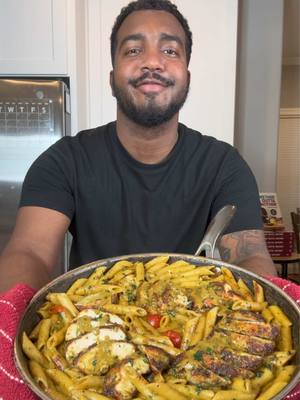 A post by @eatwitzo on TikTok caption: Creamy Pesto Chicken Pasta! Welcome to part two of the pasta series!  Back in college there was a pasta station that used to serve all different types of create your own pastas but the creamy pesto was the best hands down… So you know I had to re-create it with my own twists. Enjoy!  Full ingredient list:  1.5 lb chicken breast  12 oz cooked penne pasta  1 cup heavy cream  1/4 cup Parmesan cheese  1-2 tsp garlic powder 1-2 tsp dried oregano  1-2 tsp black pepper  1-1 1/2 tsp salt  1-1 1/2 tsp black pepper  Parsley to garnish  Parmesan cheese to garnish  *adjust seasoning if needed* Cherry tomatoes (optional)  For pesto:  Roughly 1-1 1/2 cup basil leaves  1/4 cup pine nuts  1/4 cup grated Parmesan cheese 3-4 large garlic cloves  1/2-1 cup olive oil  Salt to taste #pestopasta #chicken #eatwitzo 