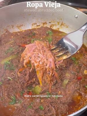 A post by @atasteofmichelle on TikTok caption: I make this dish, once a year, for my brothers birthday. He requests the same menu, and we all love him for it ❤️ Ropa Vieja, Carne Ripiada, Carne Mechada, Shredded Beef Part 1: tenderizing 8 lbs beef flank 2 garlic cloves to brown 3 tbsp salt 1 tbsp black pepper 1 tbsp ground cumin 2 tbsp oregano 1 tbsp all purpose seasoning ½ red onion 4 garlic cloves   Part 2: the stew 4 tbsp achiote oil 8 garlic cloves, chopped 1/3 cup sofrito 2 chicken bouillon cubes ½ cup tomato paste 4 cups of the reserved pressure cooker liquid 1 tbsp all purpose seasoning 1 tbsp oregano 1 cap of vinegar 2 tbsp soy sauce 1 red bell pepper 1 cubanelle pepper 1 green bell pepper 1 red onion Cilantro for garnish #bigmamacooks #carnemechada #carneripiada #ropavieja #shreddedbeef