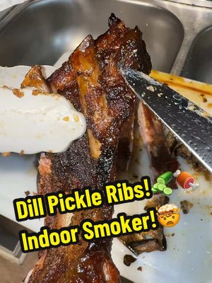 A post by @justinchopelas on TikTok caption: Prt 2 Lets cook🥒“Dill Pickle Ribs”🍖in my Indoor smoker!🤯 #fyp #Foodie #chopelasreviews #fypシ #foodvlog #foodcritic #foodreview #budgetmeal #partyplates #ribs #bbq 