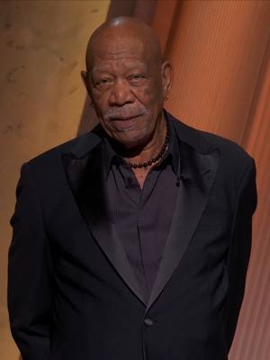 A post by @abcnews on TikTok caption: "This week our community lost a giant, and I lost a dear friend, Gene Hackman." Morgan Freeman gave tribute to Gene Hackman, four days after Hackman was found dead. ABC News cannot air the original music in this clip due to rights restrictions; music has been adjusted. #morganfreeman #inmemoriam #oscars #oscars2025 