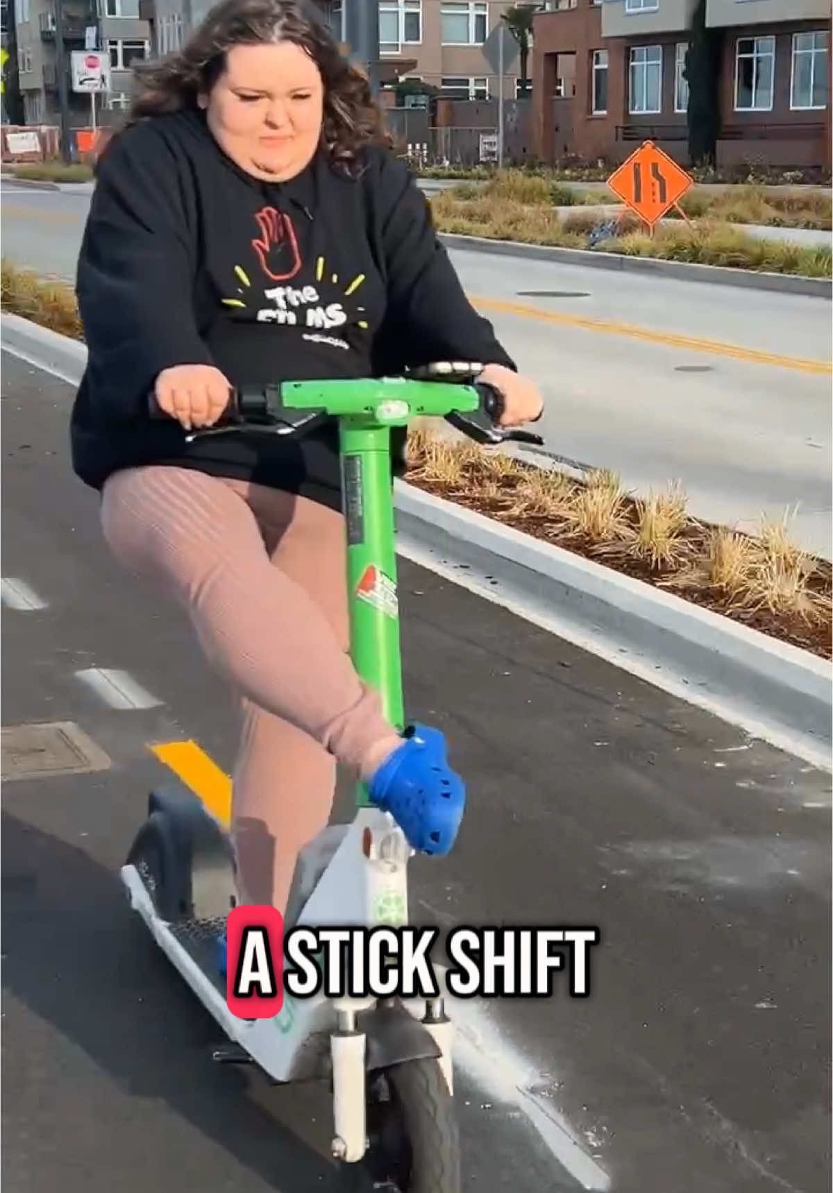 A post by @official2fiddy on TikTok caption: Stick shift scootin in Seattle 😏 #fyp #2fiddy #stopthefilms 