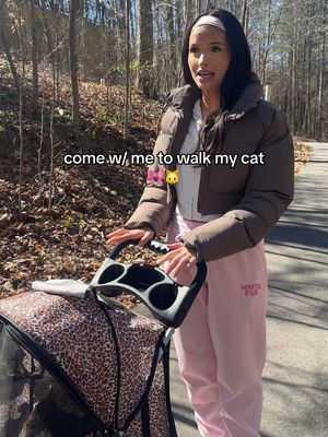 A post by @jade.amberrrrr on TikTok caption: come w/ me to walk my cat🐱🎀stroller in my amazon storefront 