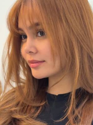 A post by @ivanaalawi on TikTok caption: New hair 🧡 #fyp 