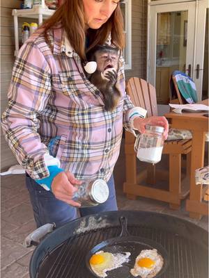 A post by @lifewithgaitlyn on TikTok caption: Morning Breakfast on the grill and gaitlyn always has to help #gaitlynrae #family #Love #animal #recipes #pet #pets #animals #fun #outside 