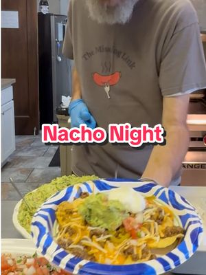 A post by @oldscoolkevmo on TikTok caption: Build your own nacho night! #oldscoolkevmo #sororitychef #piphichef #nevadawolfpack #pibetaphi 