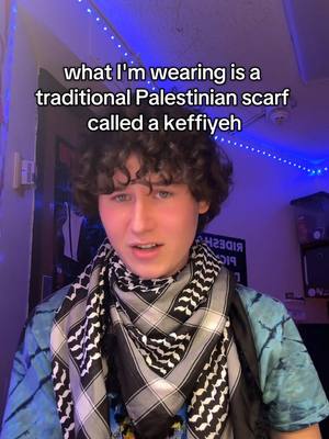 A post by @yourfavoriteguy on TikTok caption: What is this scarf? What is the #KEFFIYEH Support a family from Gaza by getting yours here @The Kufiya store #YOURFAVORITEGUY #kufiya #keffiyehtutorial 