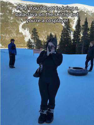 A post by @ravengriim on TikTok caption: Not me putting the eyepatch over my nose, buuut it was kind of warm😂 #tokyoghoul #cosplayfyp #animetiktok #tubing #mountains 