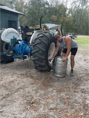 A post by @funbucketkustoms on TikTok caption: World’s first beer field tire…        #funbucketkustoms #fbk #kustom #tractor #ford4600 #diesel #tratters #beer #tires #imovecarsmf #floridatoys 