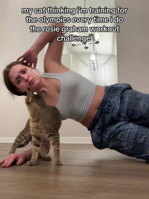 A post by @rosiegraham_ on TikTok caption: he just wanna do pilates #rosiegraham30daychallenge #wellness #Fitness #athomeworkout #rosiegraham #pilates #rosiegrahamworkout 