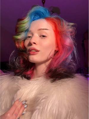 A post by @ksenkanesesh on TikTok caption: I LIKE MY NEW RAINBOW & GLITCH HAIR COLOR 🙏 ЛЮБИМКА КРАСОТУ ДЕЛАЕТ @Rina Romashkova 