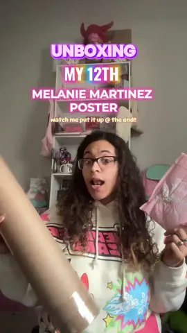 A post by @sassylox on TikTok caption: i’ve wanted this poster for SOOO long i can’t believe i got it in PERFECT condition 😭🩷 @Melanie Martinez #melaniemartinez  #melaniemartinezcollection #sassylox  #melaniemartinezmerch 