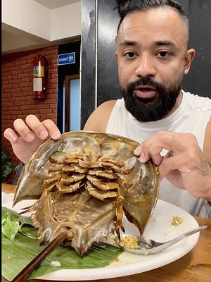 A post by @princezee on TikTok caption: eating a horseshoe crab in thailand
