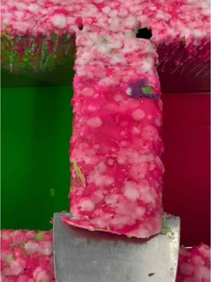 A post by @charlotte__martel on TikTok caption: pink scrapey scrapey #gsycandles #wax #asmr #oddlysatisfying 