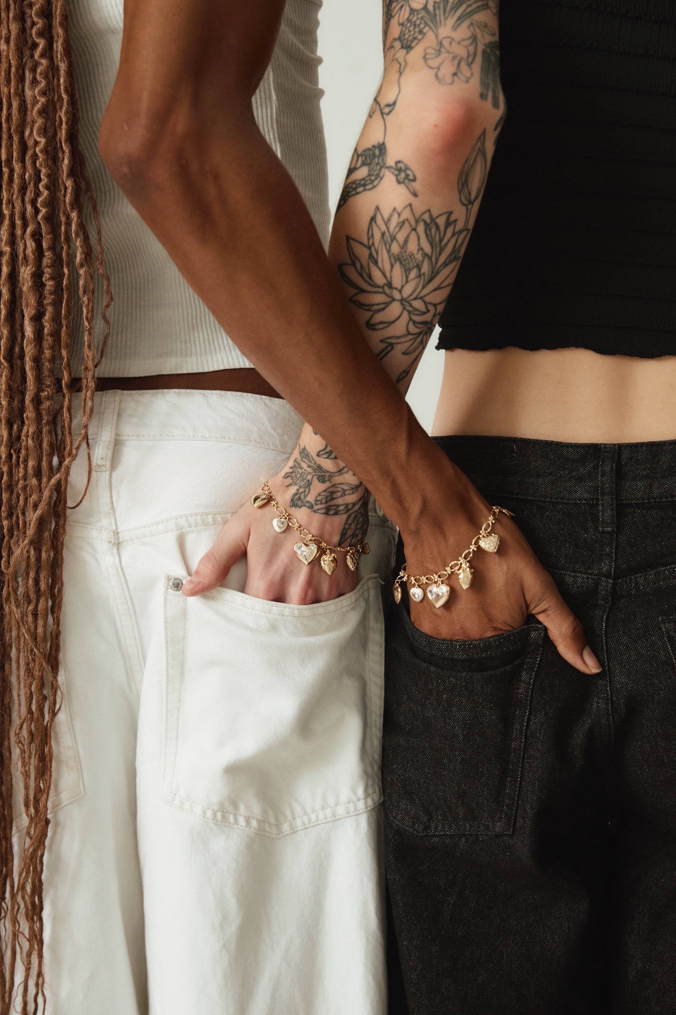 A post by @rjchumbley on TikTok caption: We have teamed up with our friends at @Brooklyn Charm to create a special charm bracelet in support of the people and areas that are affected by the LA California wildfires. The bracelet is designed with the concept of ‘sending our love’, featuring charms that represent hope, strength, and community, in high quality gold plated brass.  100% of the proceeds will be donated to The Center for Disaster Philanthropy: CA Wildfires Fund. CDP is dedicated to helping communities recover from disaster and mobilizing Philanthropy to maximize their impact through equitable grantmaking. This collaboration means so much to us, and we're so grateful to have the opportunity to make a positive impact while spreading love and support through this bracelet!!! In addition to this drop we will be participating in a giveaway of 1 bracelet!!! All you need to do is comment on @BrooklynCharm ‘s post with a ❤️✨and we will be donating the same value in your name! We will be announcing the winner on Friday March 7th at Noon!!!  We would not be able to do this without the help and guidance of Tracie at Brooklyn Charm and our photographer @Erica Joan ! If you can, please help us in ‘sending our love’ to Los Angeles! We love you Goddess Babes! 🫶🏻🫶🏿❤️✨ #lafires 