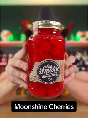 A post by @dokaryan on TikTok caption: I tried Moonshine Cherries 🍒 #cherries #moonshine #olesmoky #dokaryan #fyp #bartender 