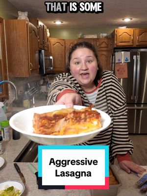 A post by @applesauceandadhd on TikTok caption: Who made it better?! @Manny Michael  or me?! #AggressiveTutorials #AggressiveTutorialLady #AggressiveCookingShow #AggressiveCookingTutorials #Aggrecipes #lazylasagna #lasagna #weeknightmeal #easylasagna 