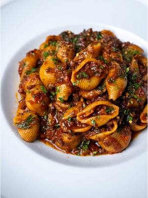 A post by @breadbakebeyond on TikTok caption: Tuscan-Style Beef Ragu Winter’s almost over, but there are still plenty of chilly days ahead, so I figured this would be the perfect time to share a slow-cooked, cozy dish. The kind that makes your kitchen smell amazing for hours and tastes even better. I went with pasta shells because they hold the sauce so well, but rigatoni, pappardelle, or spaghetti would work just as well. Enjoy! #italianfoodlover #pastanight #homemade #slowcooked #comfortfood #madefromscratch #beefragu #cookathome #kosherfood #kosher #foodieapproved #americanfoodie  Tuscan Beef Ragu Italian Meat Sauce Slow Cooked Pasta Sauce Authentic Italian Recipe Comfort Food Homemade Pasta Sauce Classic Italian Cooking