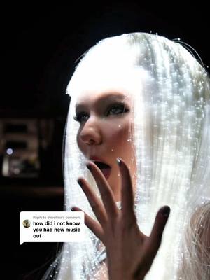 A post by @sorana on TikTok caption: Replying to @dabellina this one is called KiSS BACK  #NewMusic #neonrockstar #sorana #kissback #PopMusic #nightcore #rave #lights #lightup 