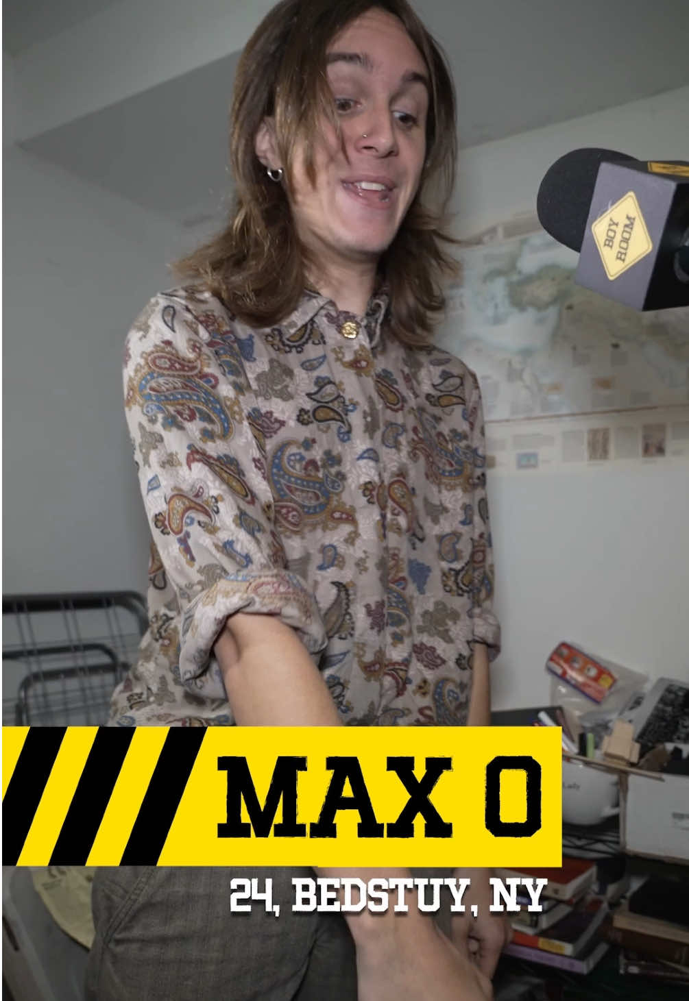 A post by @boyroomshow on TikTok caption: Max O, 24, Bedstuy, NY  Welcome to Boy Room, the show where we investigate men's bedrooms and fix them. On today's episode, Rachel visits Max O, an anthropologist whose room rocks -- literally. It's covered in rocks. hosted by @rachelcoster_  a show by @Gymnasium  in partnership with @prime  #messy #hoarders #NY #renovation #comedy #boyroom #gymnasium 