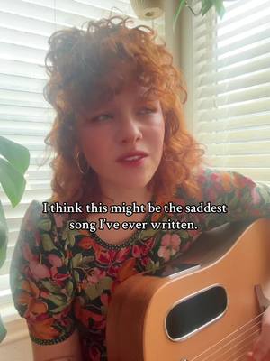 A post by @sarabethliebe on TikTok caption: It’s been a minute since I’ve written a sad girl song. Oooooof. 👍🏻🤍 #acoustic #singing #songwriter #IndieMusic #folk #country #sad #breakup #fypシ 
