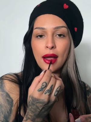 A post by @lora.arellano on TikTok caption: Nothing better than a great red lip  #meltcosmetics #MakeUpArtist #makeuptutorial #latinamakeup #redlip #redlipstickgirl #redlipstick #alttok #altmakeup 