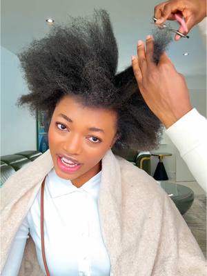 A post by @olivia_chukwu on TikTok caption: First time trimming my natural hair 🤩 #olivia_chukwu #naturalhair 