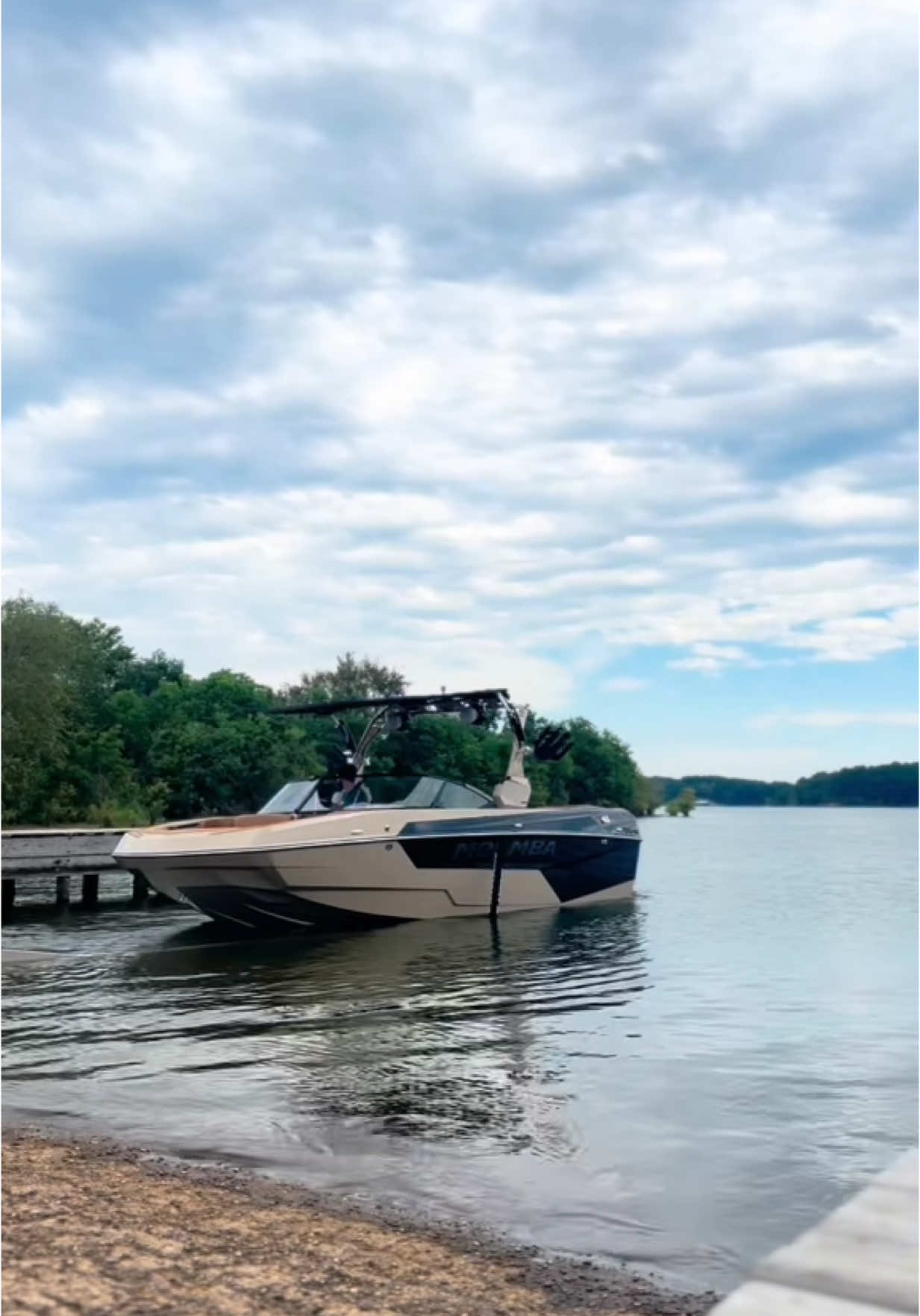 A post by @ on TikTok caption: Getting this boat Dialed in for its new home! #Moomba #supraboats #2025 #lake #summer #summervibes #boatlife #boat #Surfboat 