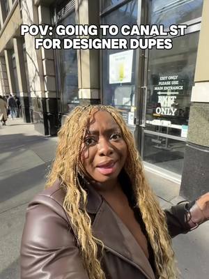 A post by @therealtati on TikTok caption: Shopping on Canal St. in NYC 🛍️ #newyork #travel 