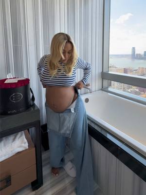 A post by @originaldreamdoll on TikTok caption: I’m love putting together pregnancy looks with @Fashion Nova  Henrietta Turtleneck Sweater - Navy/ combo Country Roads Skirt Set - Brown/ combo Matching My Energy Wide Leg Overalls - Medium Wash