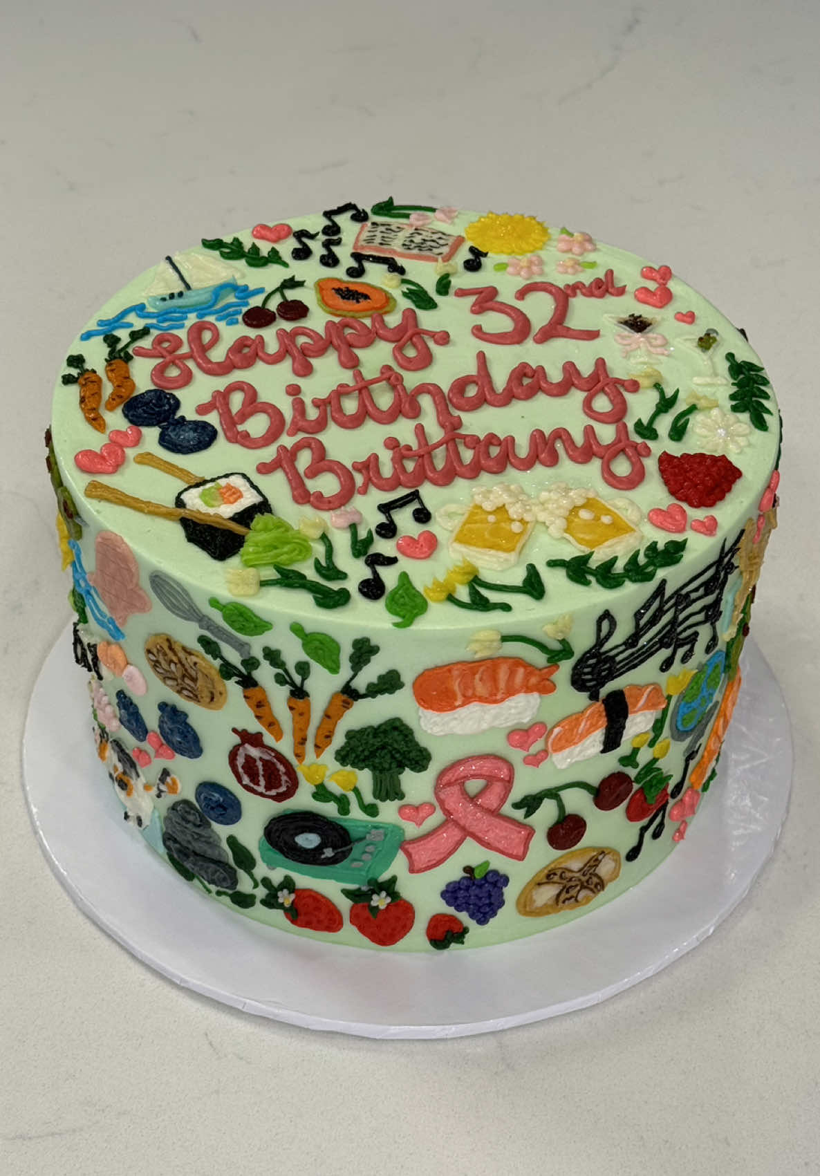 A post by @savsgotcake on TikTok caption: 4 fun cakes I made a few weeks ago🌹📚💛🦋🍣  💗🩵Gender reveal cake inspired by @sugarbarsweets on instagram  #cakedecorator #cakedecorating #cakeideas #doodlecake #bookcake #genderrevealcake #birthdaycakes #cake 