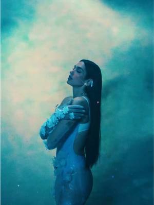 A post by @dualipaofficial on TikTok caption: Wake up!!!! Handlebars video just dropped!!!! 🕸️ @JENNIE 