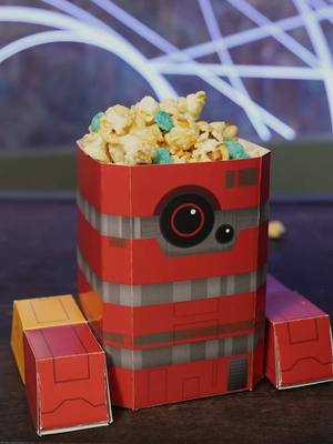 A post by @starwars on TikTok caption: B2EMO = the perfect snack companion. In anticipation of Season 2 of #Andor, revisit Season 1 streaming on @Disney+.
