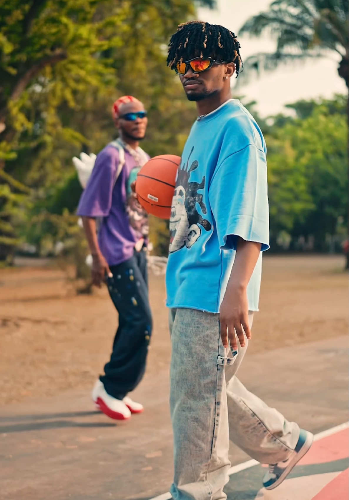 A post by @softmadeit on TikTok caption: Tag your favorite Tiktokers to recreate this DC🔥… 👕: @STEEZAVERSE ; THE BRAND ⛷️ 