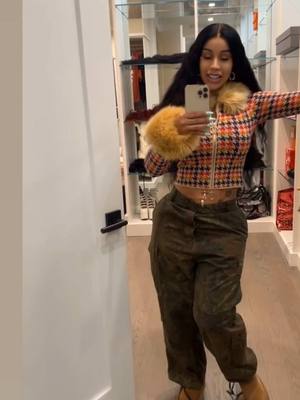 A post by @iamcardib on TikTok caption: Mommy mode 👜 😭