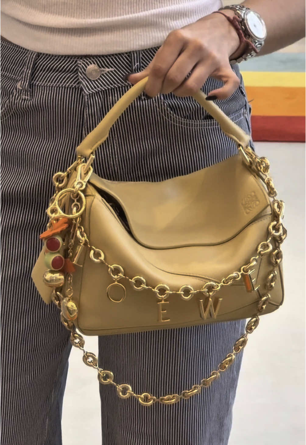 A post by @miamidesigndistrict on TikTok caption: A little love to Loewe’s new Puzzle Bag 🖐🏼#MiamiDesignDistrict  